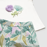 Completo con bermuda fiori e maglietta neonata 